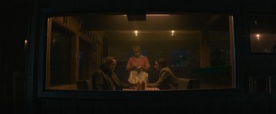 Still from Pig (2021) that has been tagged with: restaurant & exterior & painterly