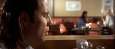 Still from Pulp Fiction (1994) that has been tagged with: restaurant & profile shot