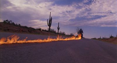 Still from Raising Arizona (1987) that has been tagged with: road & wide shot