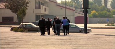 Still from Reservoir Dogs (1992) that has been tagged with: group-shot & parking lot