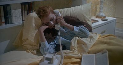 Still from Rosemary's Baby (1968) that has been tagged with: phone & medium wide