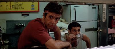 Still from Scarface (1983) that has been tagged with: cooking & coffee