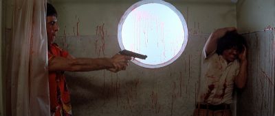 Still from Scarface (1983) that has been tagged with: bathroom & shooting