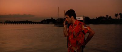 Still from Scarface (1983) that has been tagged with: sunset & profile shot
