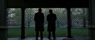 Still from Shutter Island (2010) that has been tagged with: over-the-shoulder & chainlink fence