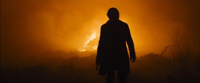 Still from Skyfall (2012) that has been tagged with: over-the-shoulder & silhouette