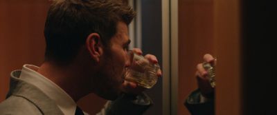 Still from Swallow (2019) that has been tagged with: drinking & mirror