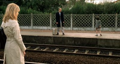 Still from The Diving Bell and the Butterfly (2007) that has been tagged with: train station & over-the-shoulder