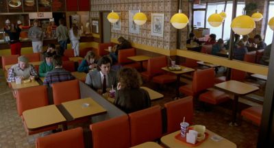 Still from The Fly (1986) that has been tagged with: restaurant & interior & wide shot