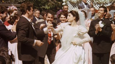 Still from The Godfather (1972) that has been tagged with: party & exterior