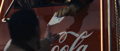 Still from Commercial: Coca Cola — "The Letter" that has been tagged with: over-the-shoulder & truck