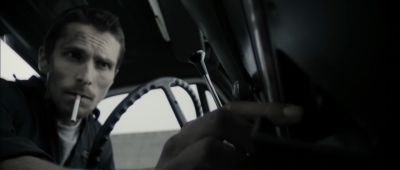 Still from The Machinist (2004) that has been tagged with: steering wheel