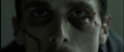 Still from The Machinist (2004) that has been tagged with: extreme close-up & eyes