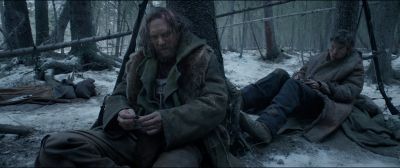 Still from The Revenant (2015) that has been tagged with: exterior & sitting