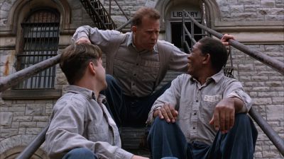 Still from The Shawshank Redemption (1994) that has been tagged with: three-shot & stairs