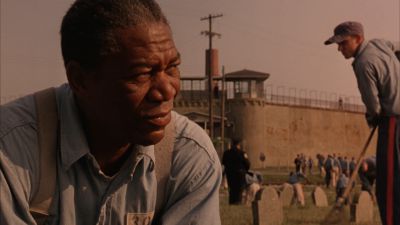 Still from The Shawshank Redemption (1994) that has been tagged with: medium close-up & prison yard