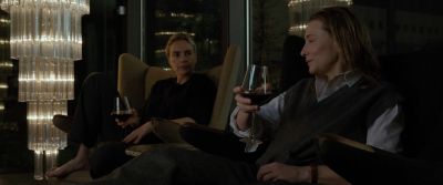 Still from Tár (2022) that has been tagged with: drinking & living room