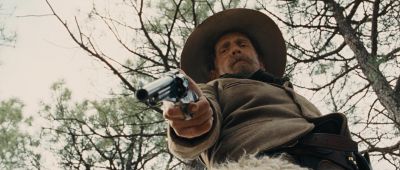 Still from True Grit (2007) that has been tagged with: gun & looking down & day