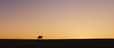 Still from True Grit (2007) that has been tagged with: sunset & clean single