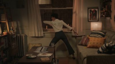 Still from Commercial: Apple - HomePod — "Welcome Home" that has been tagged with: over-the-shoulder & dancing