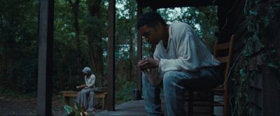 Still from 12 Years a Slave (2013) that has been tagged with: exterior & sitting & two-shot