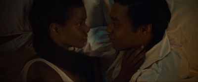 Still from 12 Years a Slave (2013) that has been tagged with: night & kiss & profile shot & two-shot