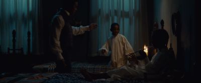 Still from 12 Years a Slave (2013) that has been tagged with: child & bed & interior & bedroom & night