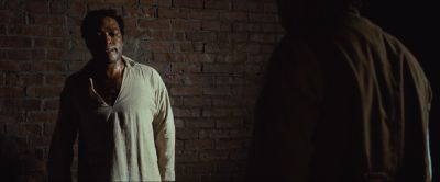 Still from 12 Years a Slave (2013) that has been tagged with: brick wall & medium shot & interior