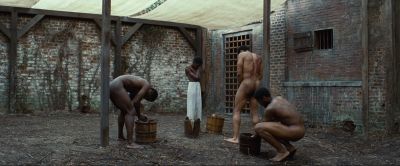 Still from 12 Years a Slave (2013) that has been tagged with: group-shot & nudity & day & wide shot