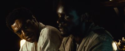 Still from 12 Years a Slave (2013) that has been tagged with: 1a2321 & night & two-shot & medium close-up