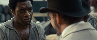 Still from 12 Years a Slave (2013) that has been tagged with: c19b6c & two-shot & exterior & over-the-shoulder