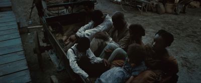 Still from 12 Years a Slave (2013) that has been tagged with: group-shot & wide shot & carriage