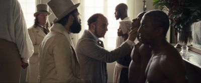 Still from 12 Years a Slave (2013) that has been tagged with: medium shot & day & nudity & interior