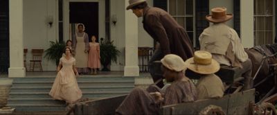 Still from 12 Years a Slave (2013) that has been tagged with: over-the-shoulder & carriage & wide shot & group-shot & day