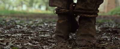 Still from 12 Years a Slave (2013) that has been tagged with: mud & close-up & day & exterior