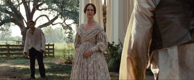 Still from 12 Years a Slave (2013) that has been tagged with: exterior & day & over-the-shoulder & tree