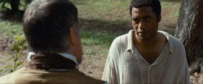 Still from 12 Years a Slave (2013) that has been tagged with: medium shot & two-shot & day & exterior