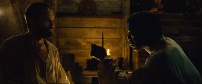 Still from 12 Years a Slave (2013) that has been tagged with: interior & night & candles