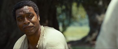 Still from 12 Years a Slave (2013) that has been tagged with: day & over-the-shoulder & medium close-up & exterior