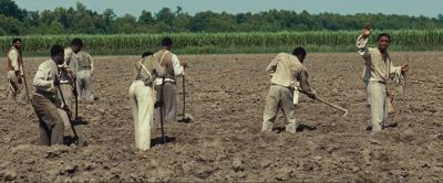 Still from 12 Years a Slave (2013) that has been tagged with: day & wide shot & group-shot & field