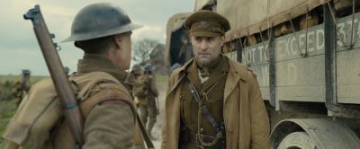 Still from 1917 (2019) that has been tagged with: military & historical & army & over-the-shoulder & gun & war zone & medium shot