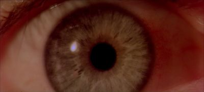Still from 2001: A Space Odyssey (1968) that has been tagged with: 6e1c1c & eyeball & insert & eye & day