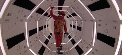 Still from 2001: A Space Odyssey (1968) that has been tagged with: 933e42 & over-the-shoulder & clean single & wide shot