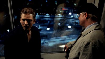 Still from 25th Hour (2002) that has been tagged with: medium wide & night & interior & high-angle
