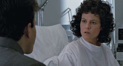 Still from Aliens (1986) that has been tagged with: 696969 & over-the-shoulder & day & two-shot & hospital room
