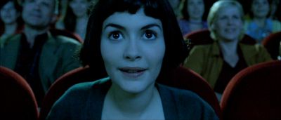 Still from Amelie (2001) that has been tagged with: night & movie theater & close-up