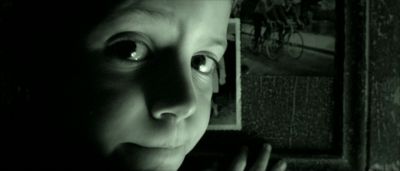 Still from Amelie (2001) that has been tagged with: 000000 & close-up & black and white & interior