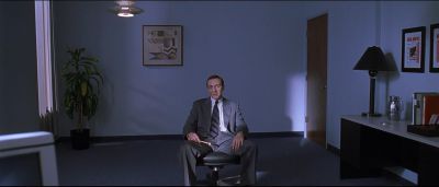 Still from American Beauty (1999) that has been tagged with: wide shot & interior & office