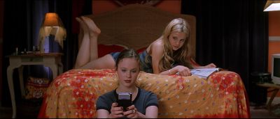 Still from American Beauty (1999) that has been tagged with: video game & bedroom & practical lamp