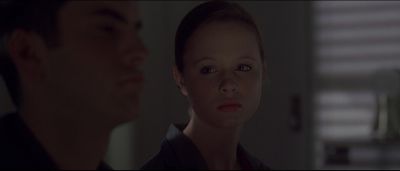 Still from American Beauty (1999) that has been tagged with: 331414 & over-the-shoulder & night & interior & medium close-up